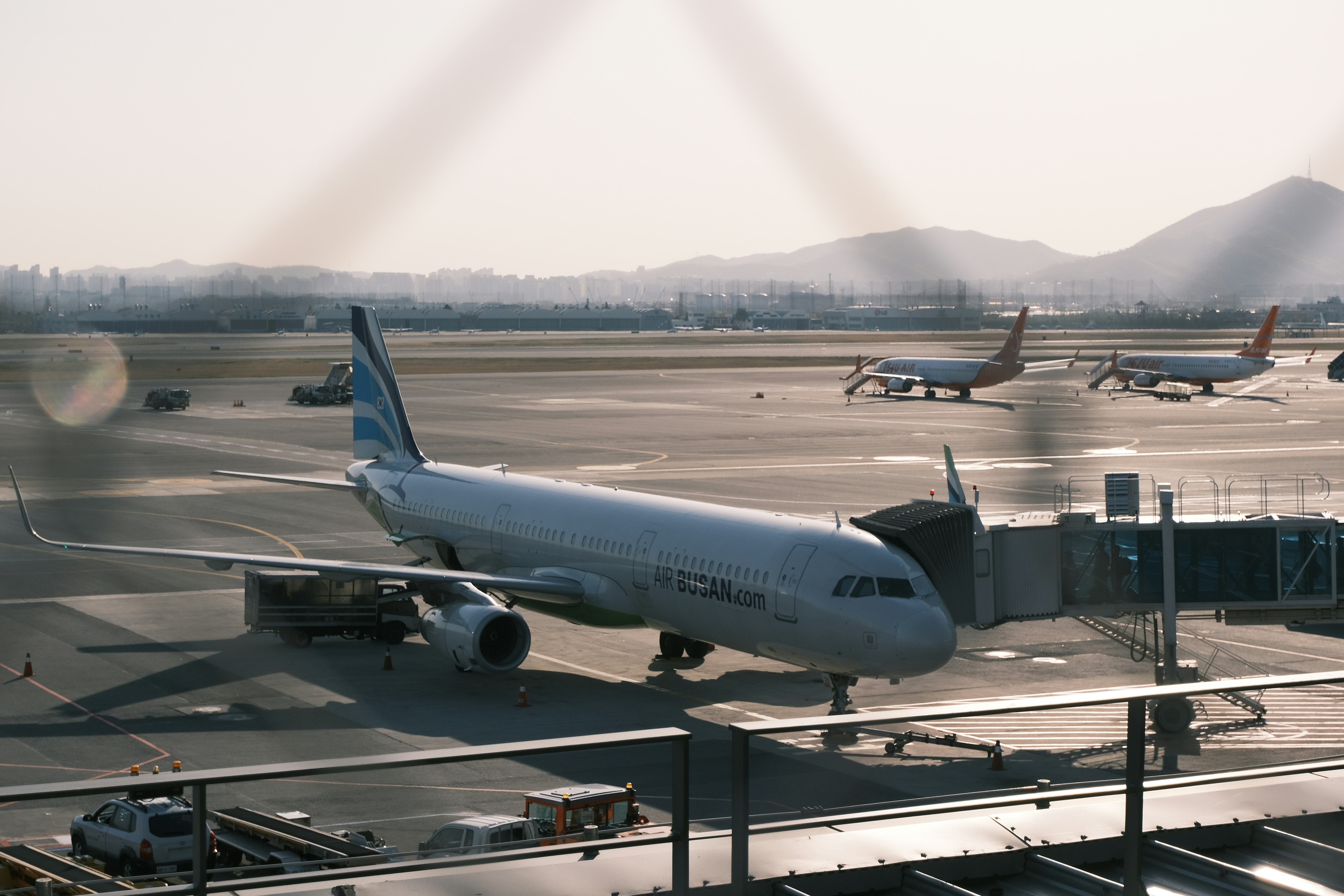 white passenger plane on airport during daytime